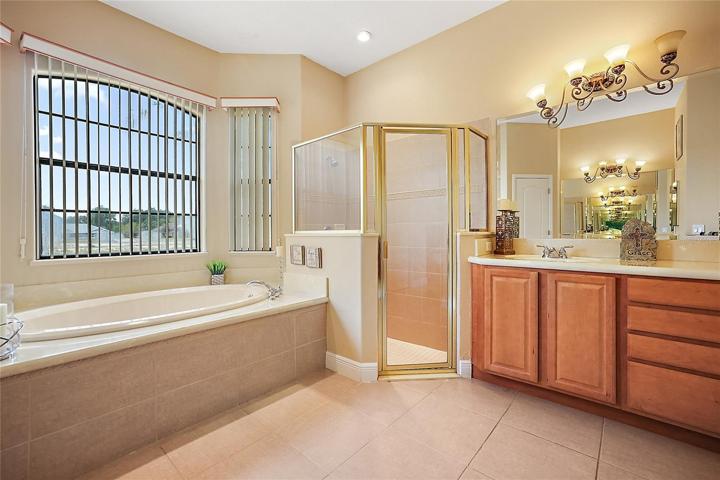 Master Bathroom with Walk-in Shower and Dual Vanities