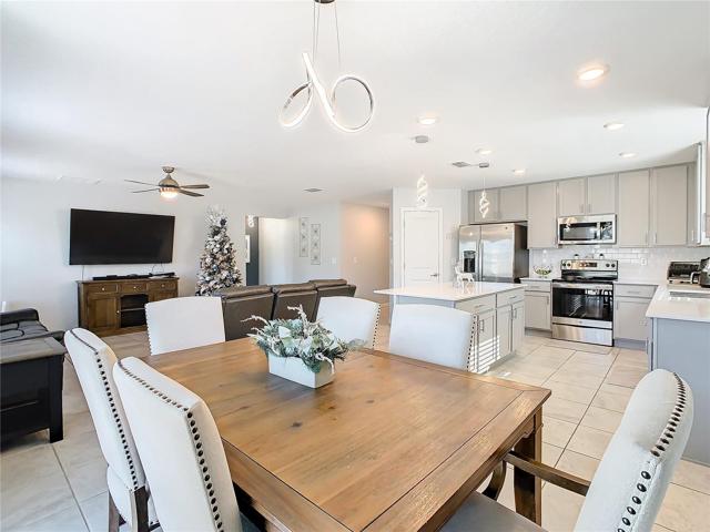 Overview of Family Room, Dining Room and Kitchen.