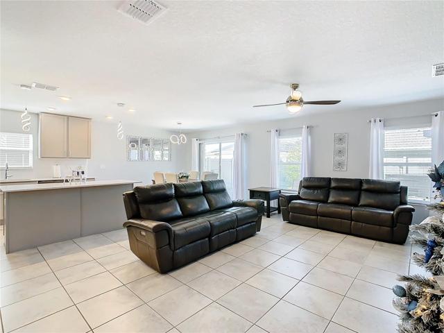Partial view of Family Room and Kitchen.