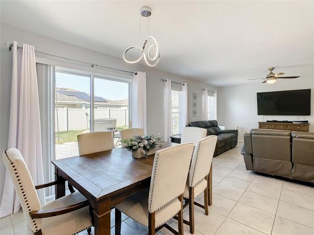 Dining Room Area and Exterior View Showing the  Jacuzzi.