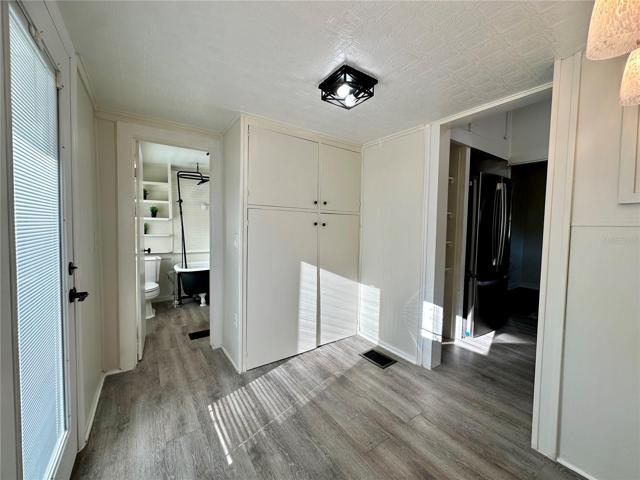 laundryroom leads to the bathroom