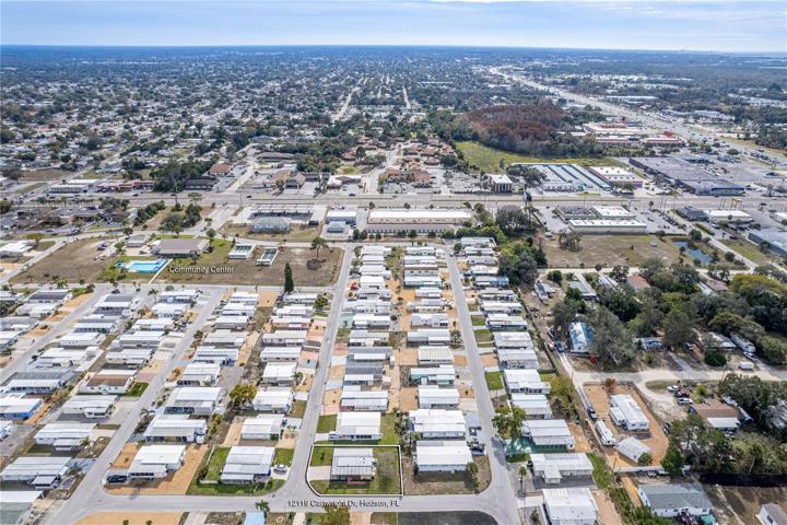 See approx. property lines and where it is labeled community center, only a walk away to that heater pool!