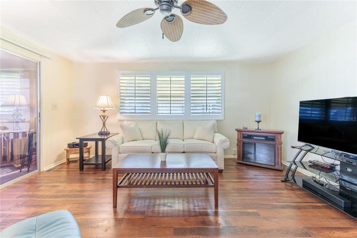 Beautiful flooring, new windows & custom plantation shutters