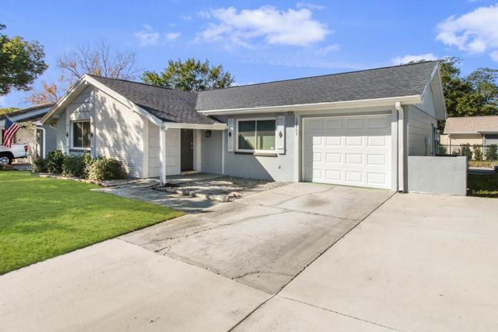 Stunning 2 bedroom/2 bath, 1 car garage single family home with extended driveway that can park up to 4 cars