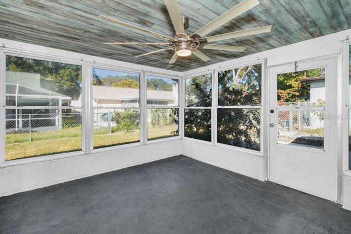 Enclosed Patio Area with Modern LED fan