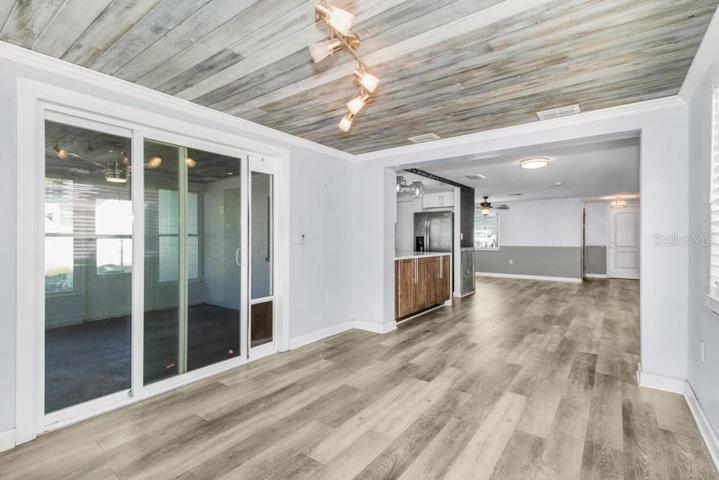 View from formal dining area that could be turned into a 3rd bedroom, flex/office space, or 2nd living area, if desired