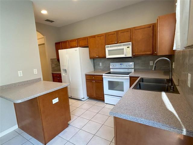 Kitchen with large pantry & microwave