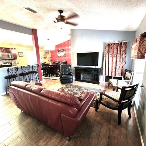 Living Room looking into Kitchen & Dining Room