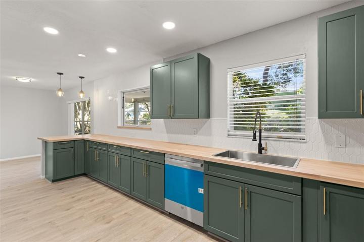kitchen showing back out toward living/dining area