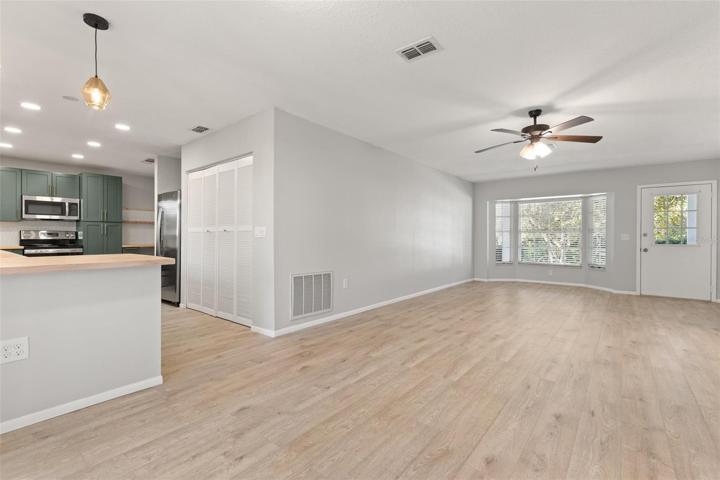 living/dining showing coming from kitchen