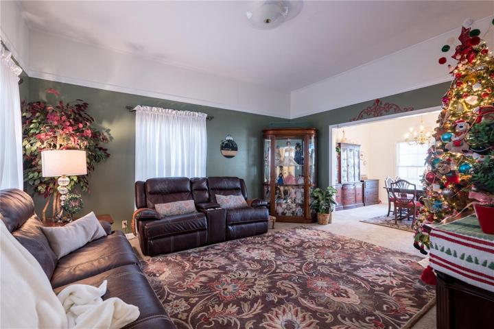 Formal living room, located to the left of the entryway of primary residence.