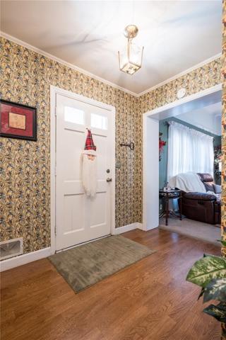Hallway view of primary residence. With view towards the formal living room.