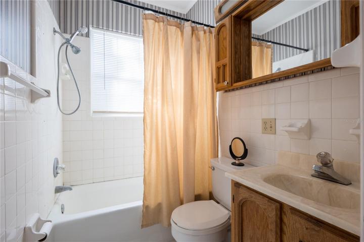upstairs master bedroom with view of bathroom