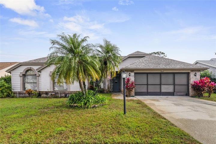 This spacious home delivers 4-bedrooms, 2-bathrooms, a NEWER ROOF (2019), updated primary bath, TANKLESS WATER HEATER and a large fenced backyard!