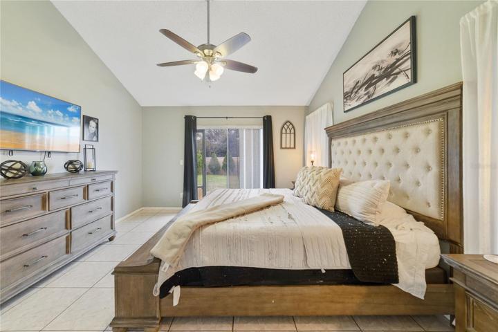 Your PRIMARY SUITE is another great space with one of the VAULTED CEILINGS you will find throughout, its own access to the backyard, WALK-IN CLOSET and private en-suite bath that has been remodeled to include an extended dual sink vanity and large WALK-IN SHOWER behind seamless glass!