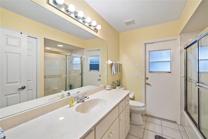 Guest Bathroom - also the Pool Bath.  Door to pool in background
