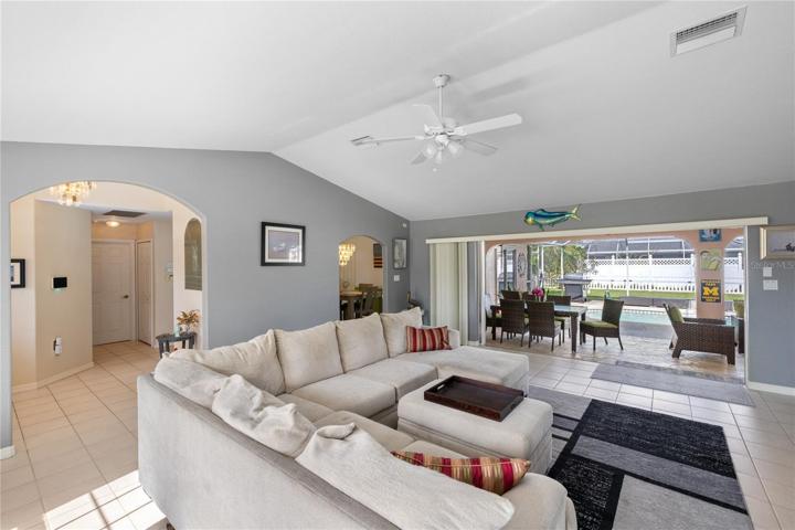 Living Room - Foyer to the left, Entry to the Dinig Room and the Lanai in the background