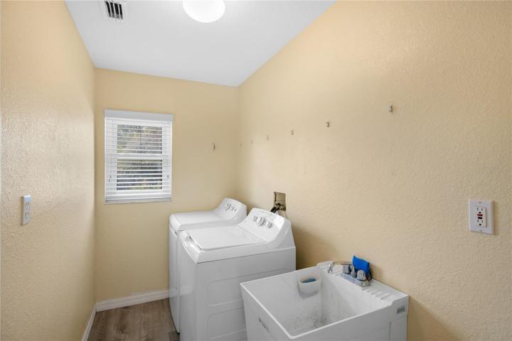 Laundry Room located to the left of the Foyer by the Garage entrance
