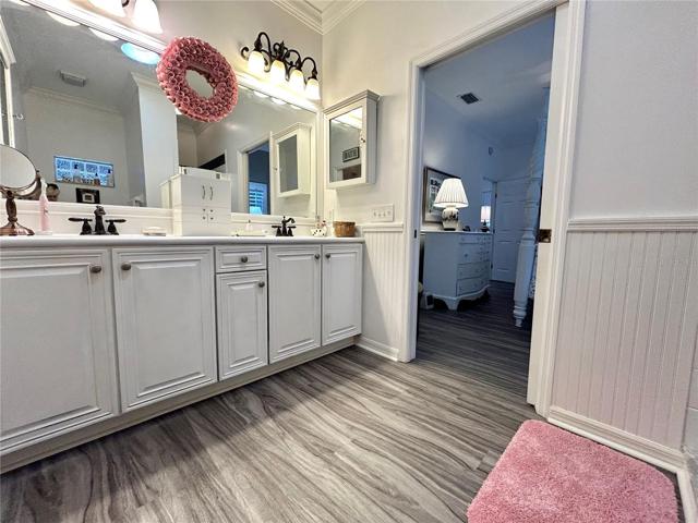 Master bath pocket door separating bedroom from bath