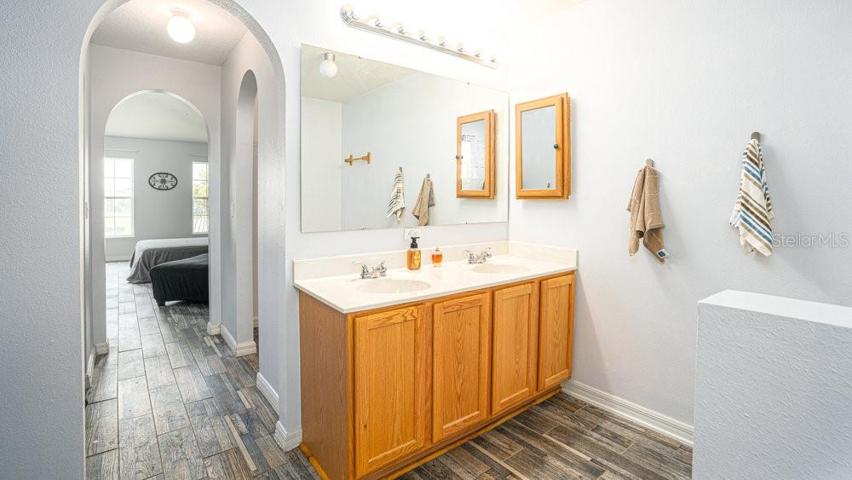 Primary en-suite bath with dual vanities