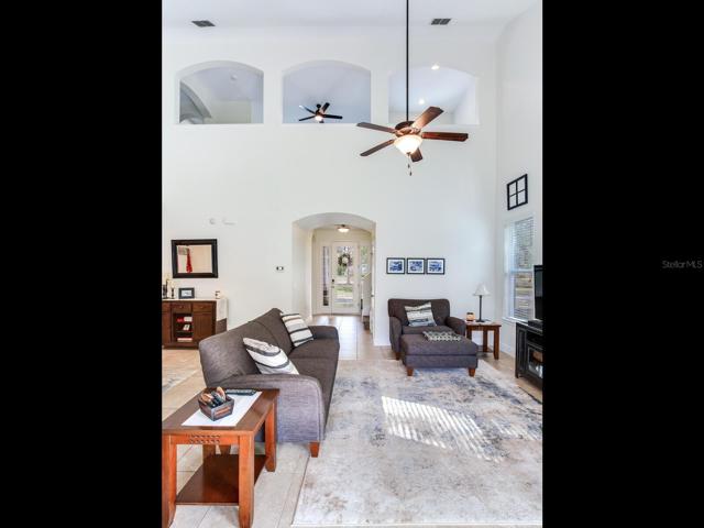 living room with loft area in view