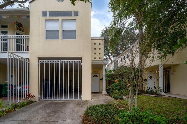 Gated carport with interior storage room
