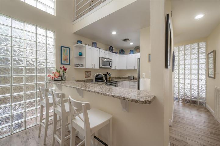 Granite countertops and breakfast bar