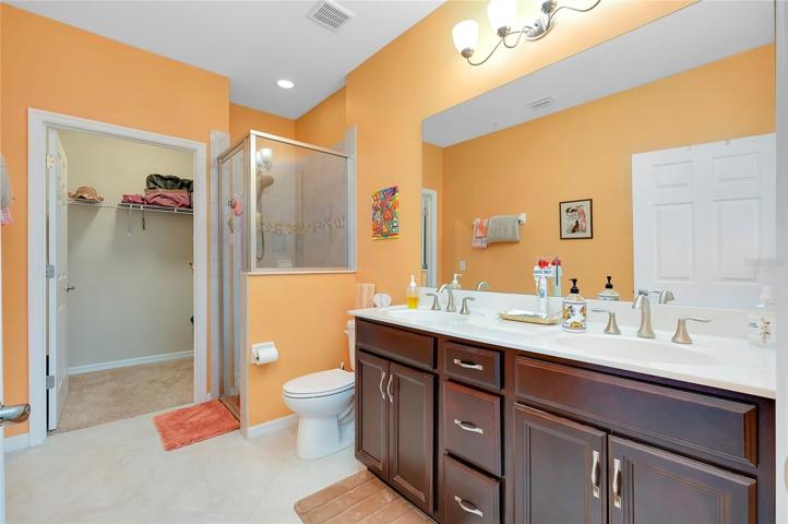 Primary Bath with stand up shower and walk in closet