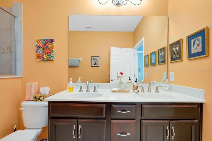 Primary Bath with stand up shower and walk in closet