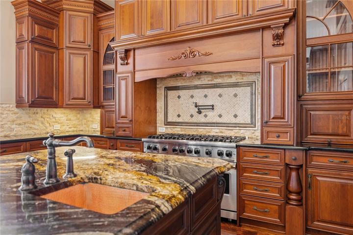 Kitchen island w/ copper prep sink