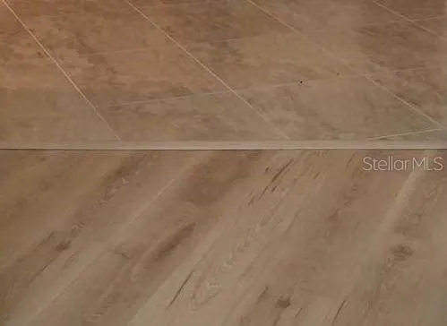 NEW LAMINATE FLOORING in bedrooms and den.
