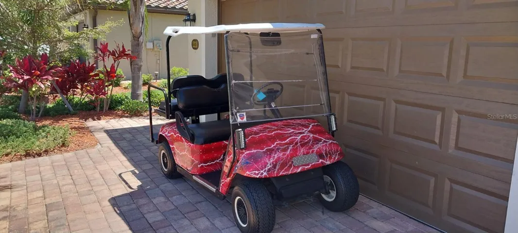 2009 Golf Cart with brand new tires, batteries, charger and bushings.