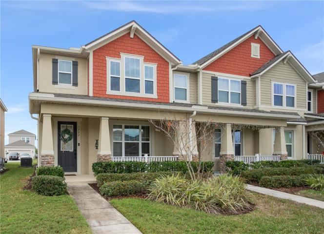Front view. Corner Unit. 2 parking space garage access located on the back of the home.