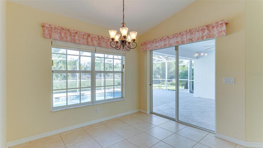 Dining Room overlooking Patio/Pool
