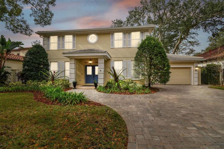 Gorgeous exterior w/brick paver driveway.
