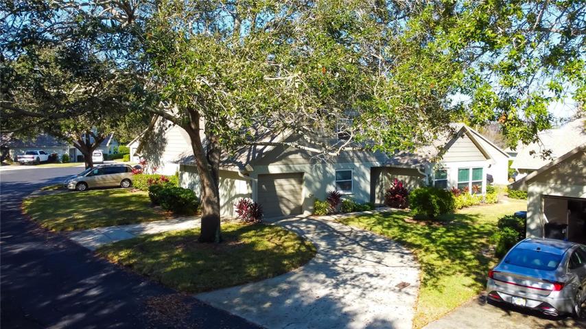 Tastefully Updated Townhome in Desirable Community with 2 Driveways + 1 Car Garage!!