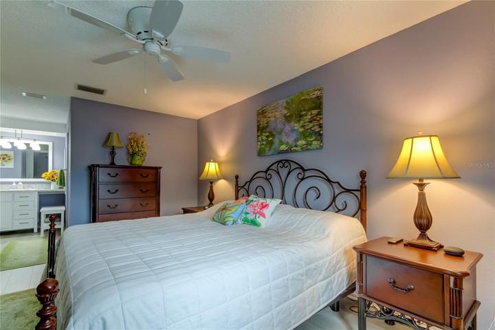 King Size Bed in Owners Retreat.. Illustrates How Spacious the Room Really Is..