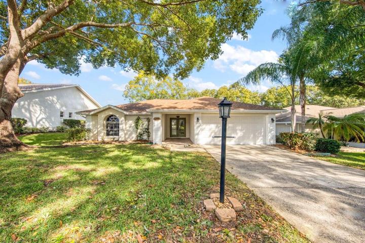 Gillespie is a shade tree lined drive close to main clubhouse & golf building~