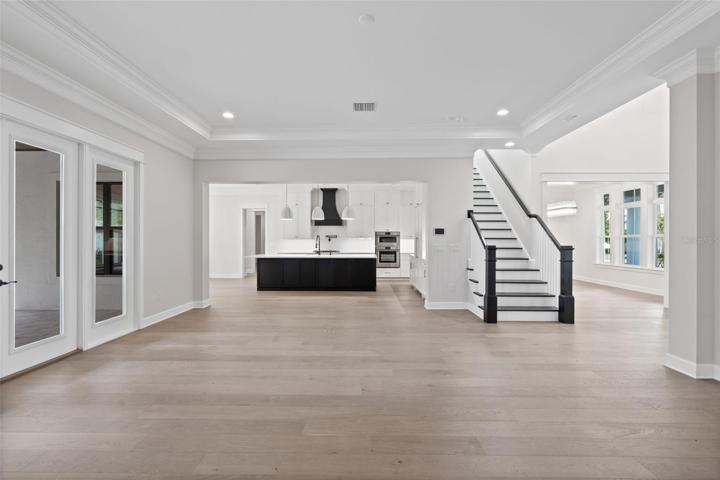Great room over looking kitchen in similar completed home