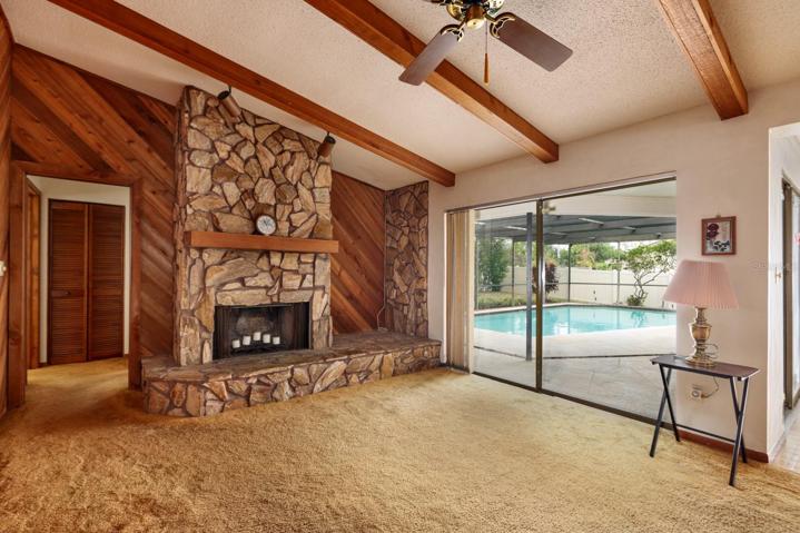 Family Room with access to Lanai & Pool Deck