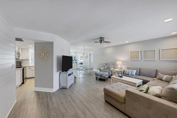 Open Floor Plan throughout with Shaw luxury vinyl flooring, recessed lights, shiplap accents and designer light fixtures.