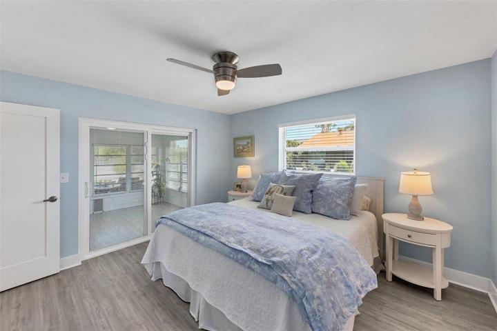Light and Airy En Suite Bedroom with  it's own access to Sun-Filled Florida Room