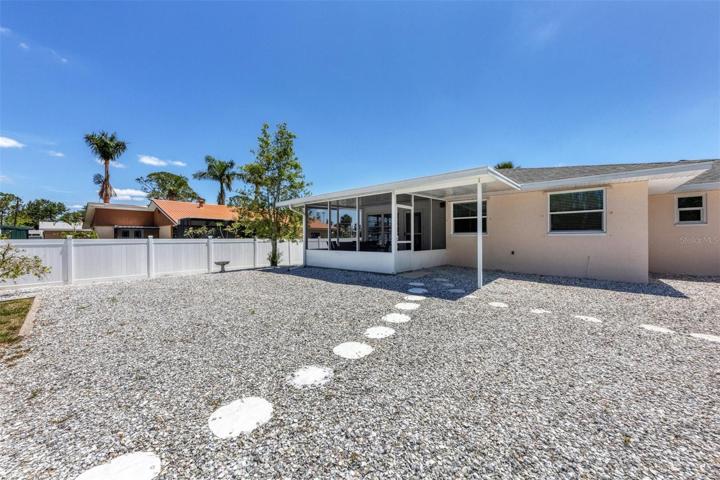 Spacious fenced backyard with plenty of room for a pool