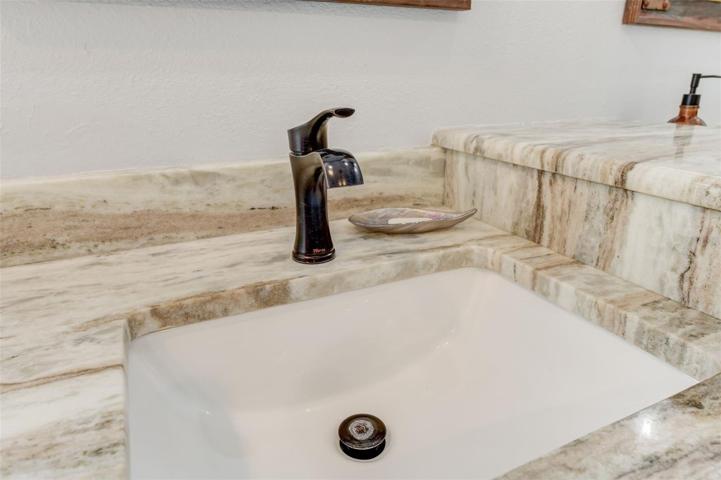 Exotic Granite Counters & Designer Fixtures