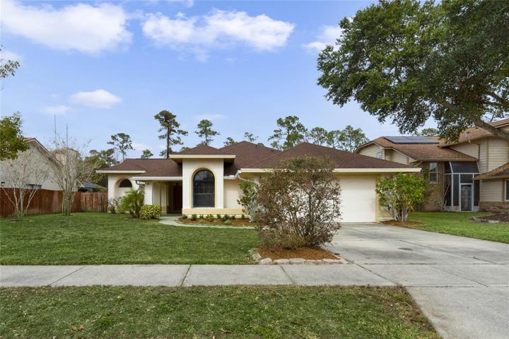 If you are looking to own a home in the East Orlando area with a **NEWER ROOF** and **NO HOA** situated on a LARGE LOT (.23 ACRES) with a CONSERVATION VIEW, look no further than Wyndcliff Circle!