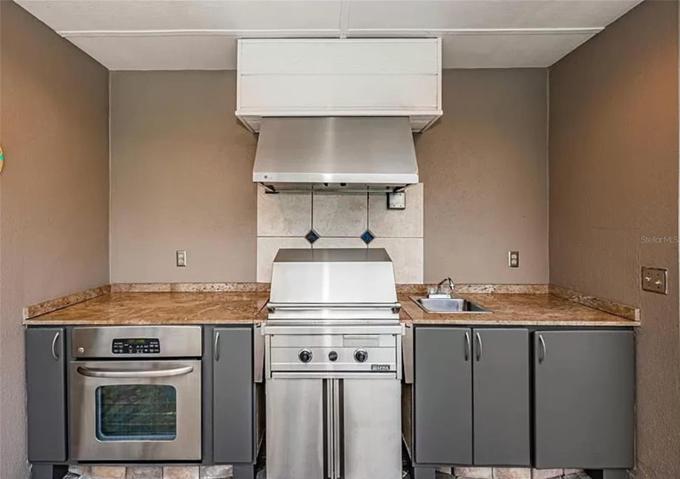 Outdoor kitchen oven and grill.