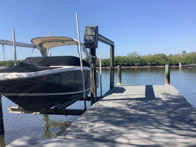 10K lb boat lift or pilings for a sailboat at right.