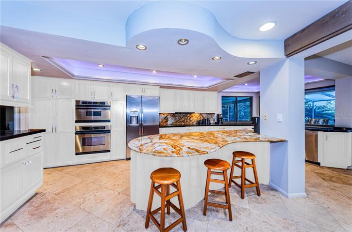 Virtually Staged: Wonder what the kitchen would look like painted white?