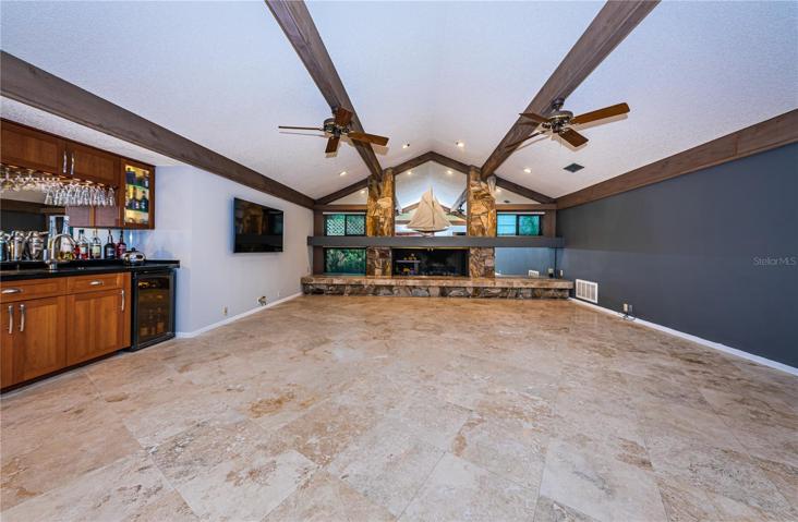 Wet bar with wine cooler.