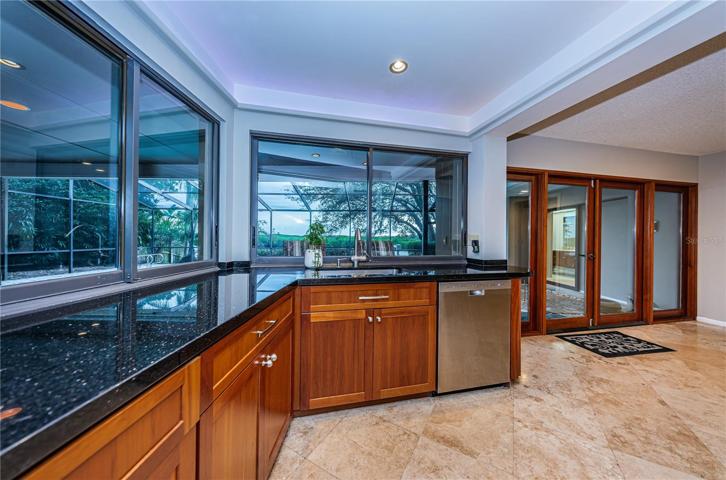 Kitchen windows pass through to lanai.